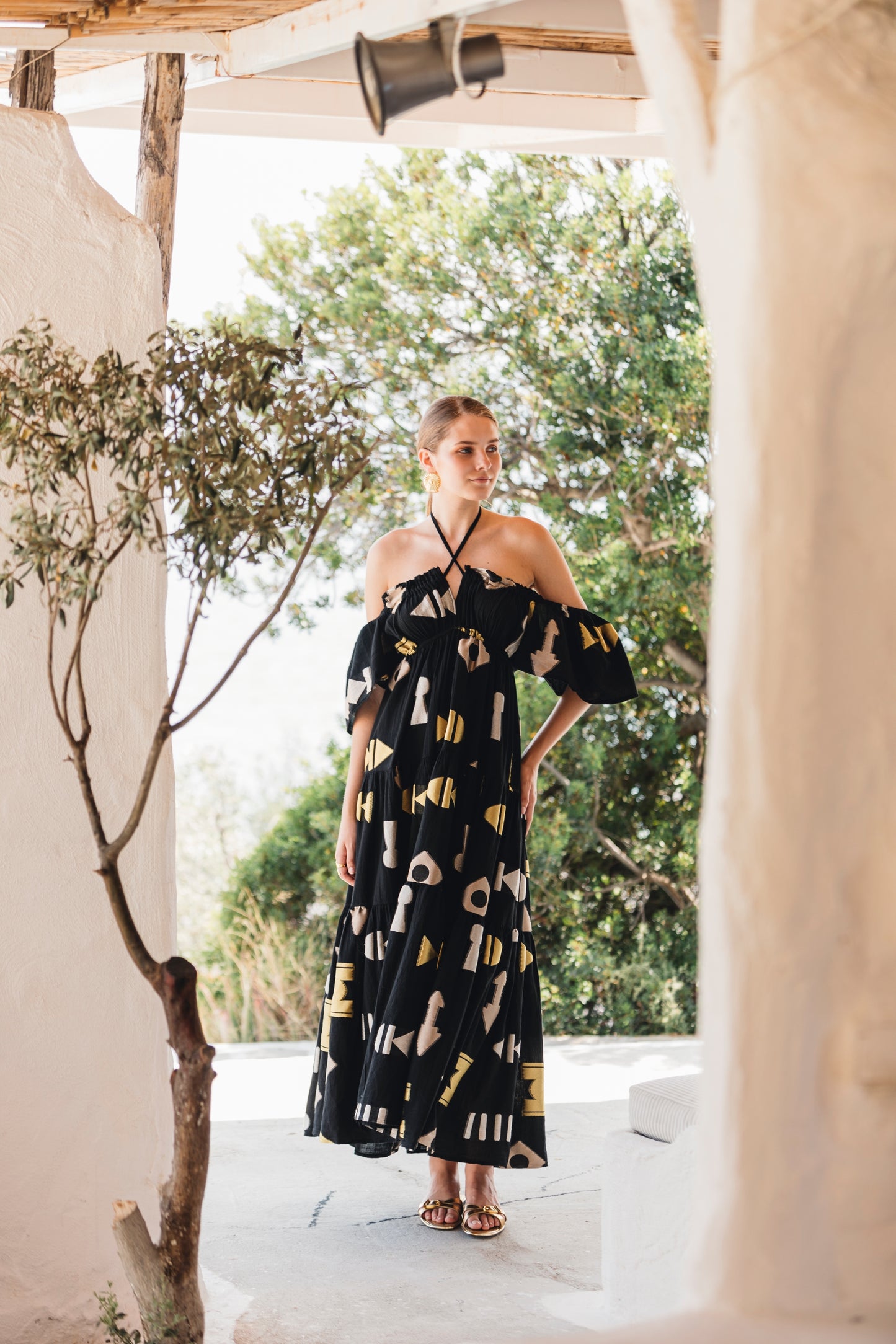 Front facing 3 **PRE-ORDER 1st APRIL** Nema Sadie Embroidered Black Geometric Dress. The perfect addition to your luxury designer resort wear wardrobe.