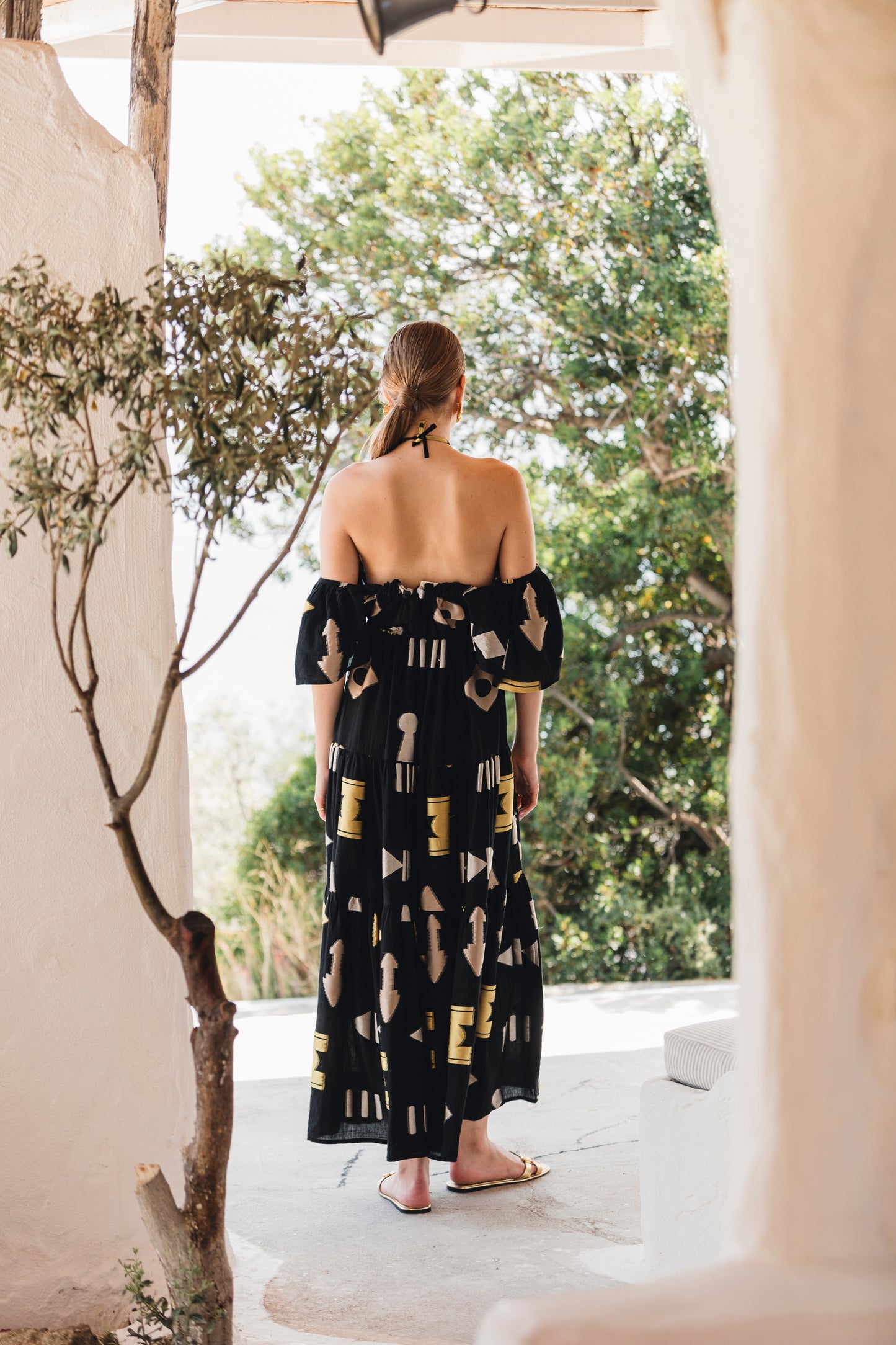 Back facing **PRE-ORDER 1st APRIL** Nema Sadie Embroidered Black Geometric Dress. The perfect addition to your luxury designer resort wear wardrobe.