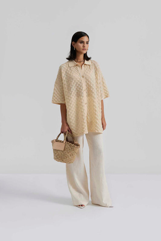 Front facing 2 Malina Short sleeve crocheted shirt with buttons in the front. The perfect addition to your luxury designer resort wear wardrobe.