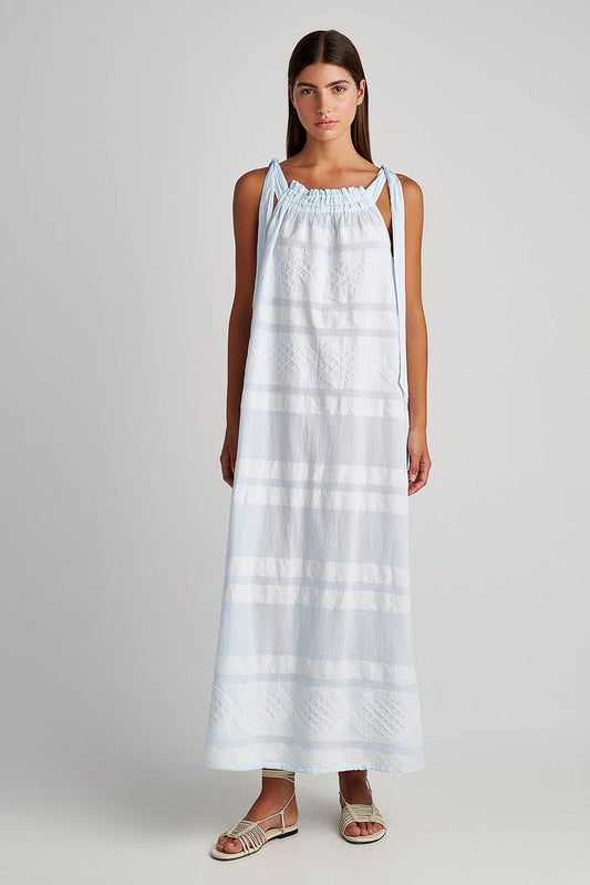 Front facing Pearl & Caviar Tie shoulder strap baby blue maxi dress with textured fabric.The perfection addition to your luxury designer resort wear wardrobe.