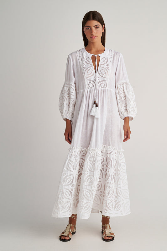 Front facing Pearl & Caviar Long sleeve pure white maxi dress with layered cut-out detailing. The perfect addition to your luxury designer resort wear wardrobe.