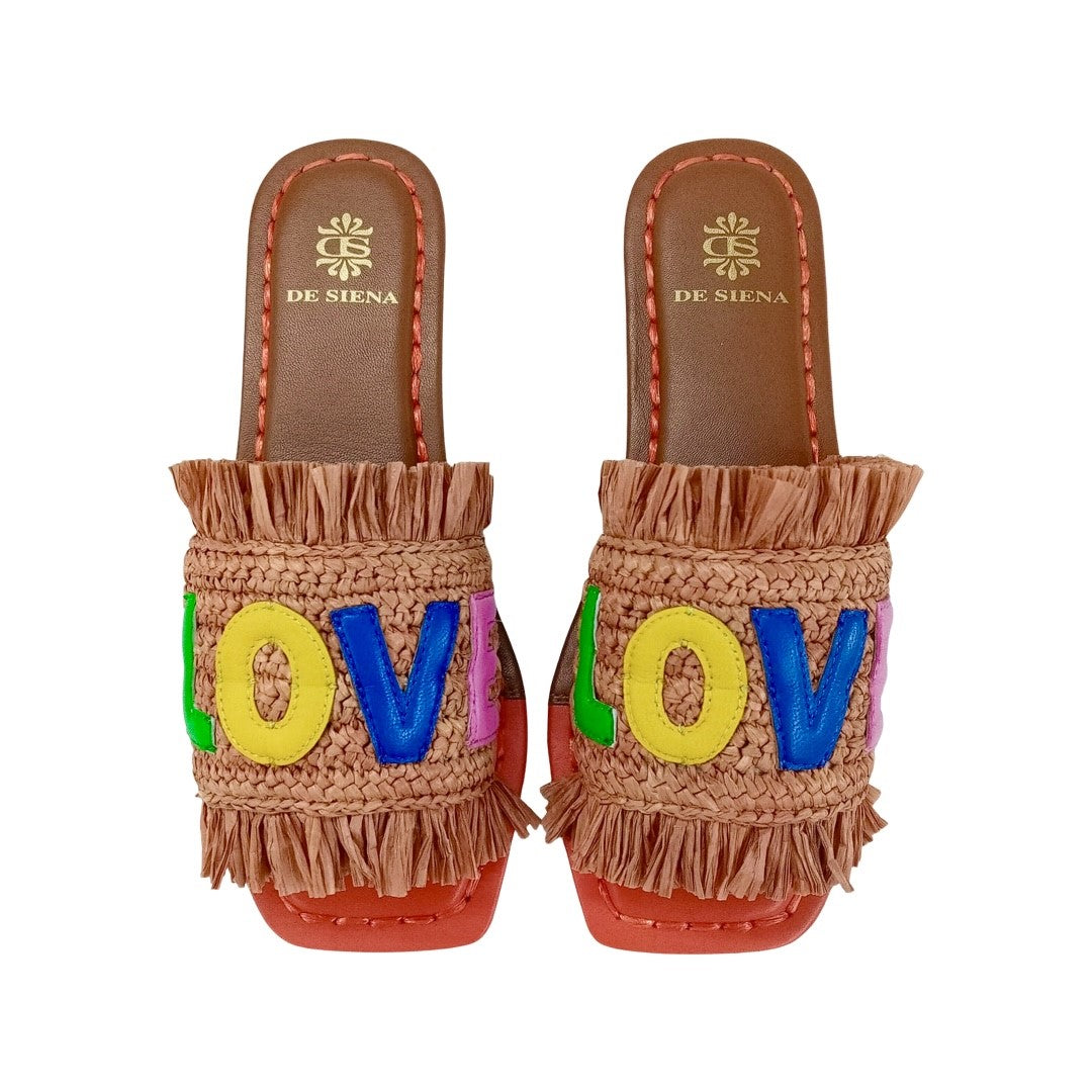 Front facing De Siena Raffia Sandals with applique leather love letters. The perfect addition to your luxury designer resort wear wardrobe.
