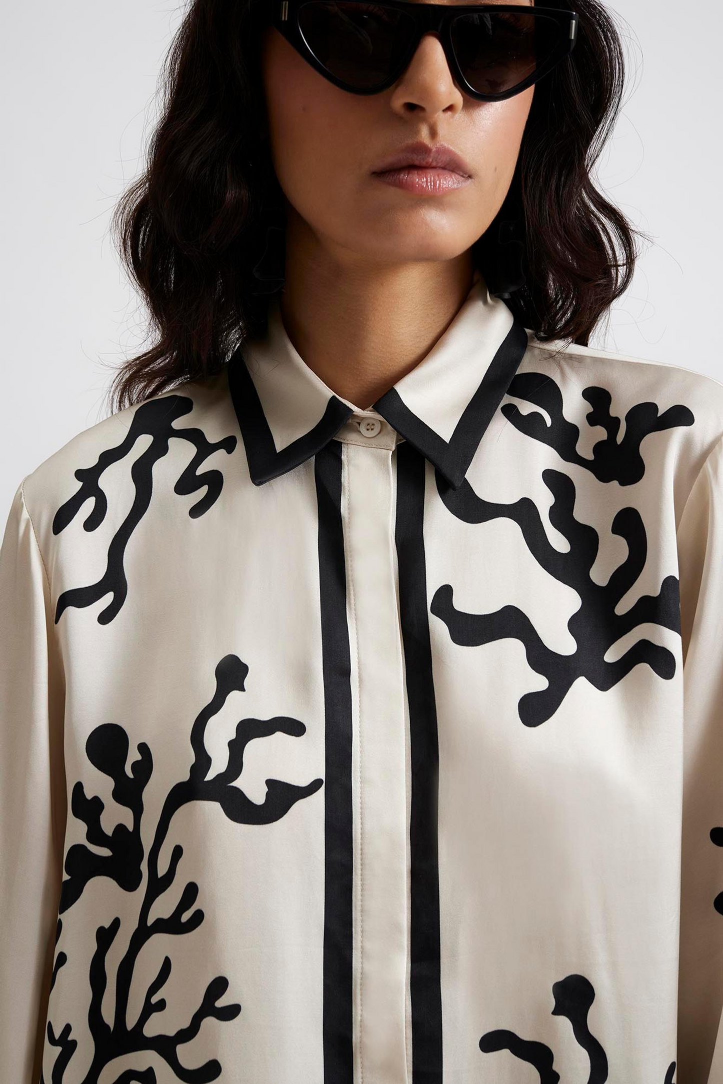 Front facing 3 Malina Printed shirt in a wide fit with long sleeves and hidden button closure. The perfect addition to your luxury designer resort wear wardrobe.