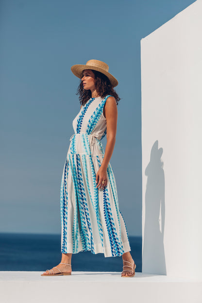 Side facing Nema Neira Jacquard Blue Maxi Dress. The perfect addition to your luxury designer resort wear wardrobe.  