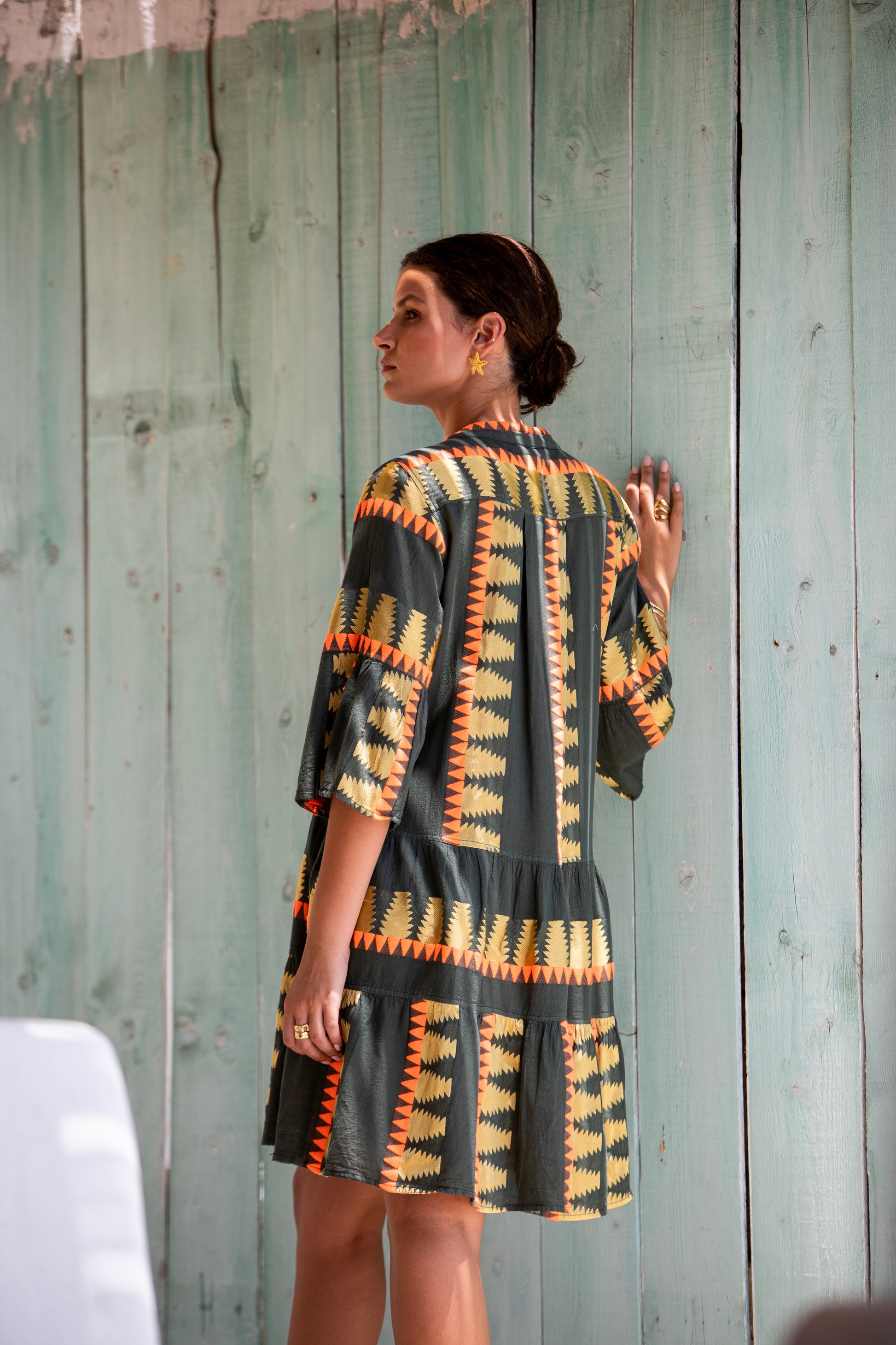 Side back facing **PRE-ORDER 1st APRIL** Nema Zadie Embroidered Aztec Khaki Dress. The perfect addition to your luxury designer resort wear wardrobe.  Made in Greece. 