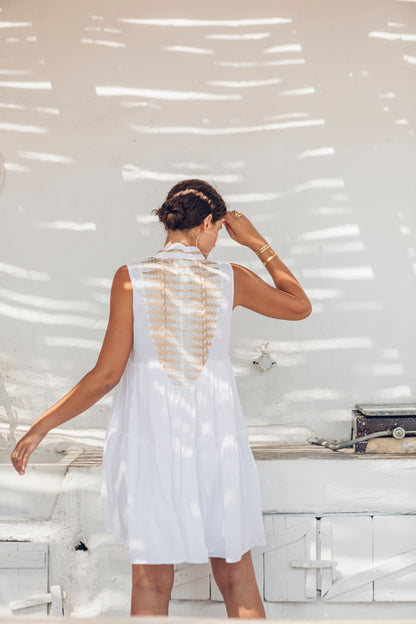 Back facing **PRE-ORDER 1st APRIL** Nema Dafne White Sleeveless Dress With Gold Embroidery. The perfection addition to your luxury designer resort wear wardrobe. 