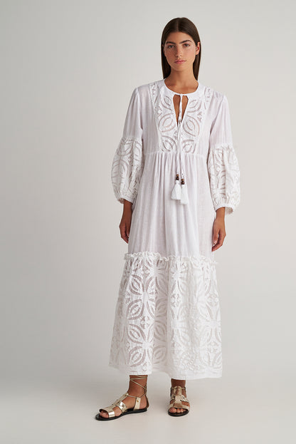 Front facing 2 Pearl & Caviar Long sleeve pure white maxi dress with layered cut-out detailing. The perfect addition to your luxury designer resort wear wardrobe.  