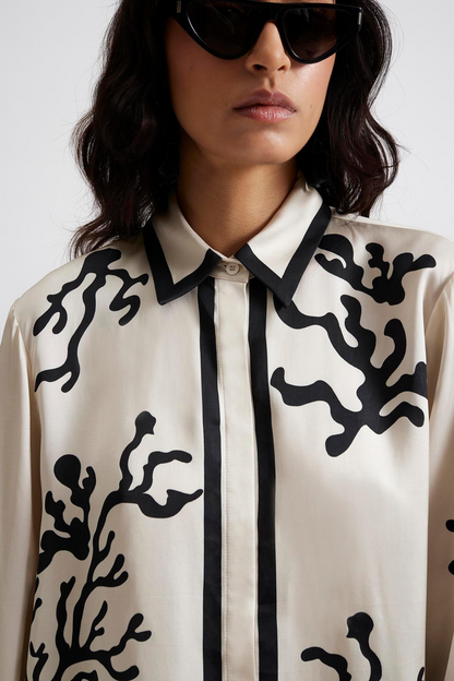 Front facing 3 Malina Printed shirt in a wide fit with long sleeves and hidden button closure. The perfect addition to your luxury designer resort wear wardrobe.  